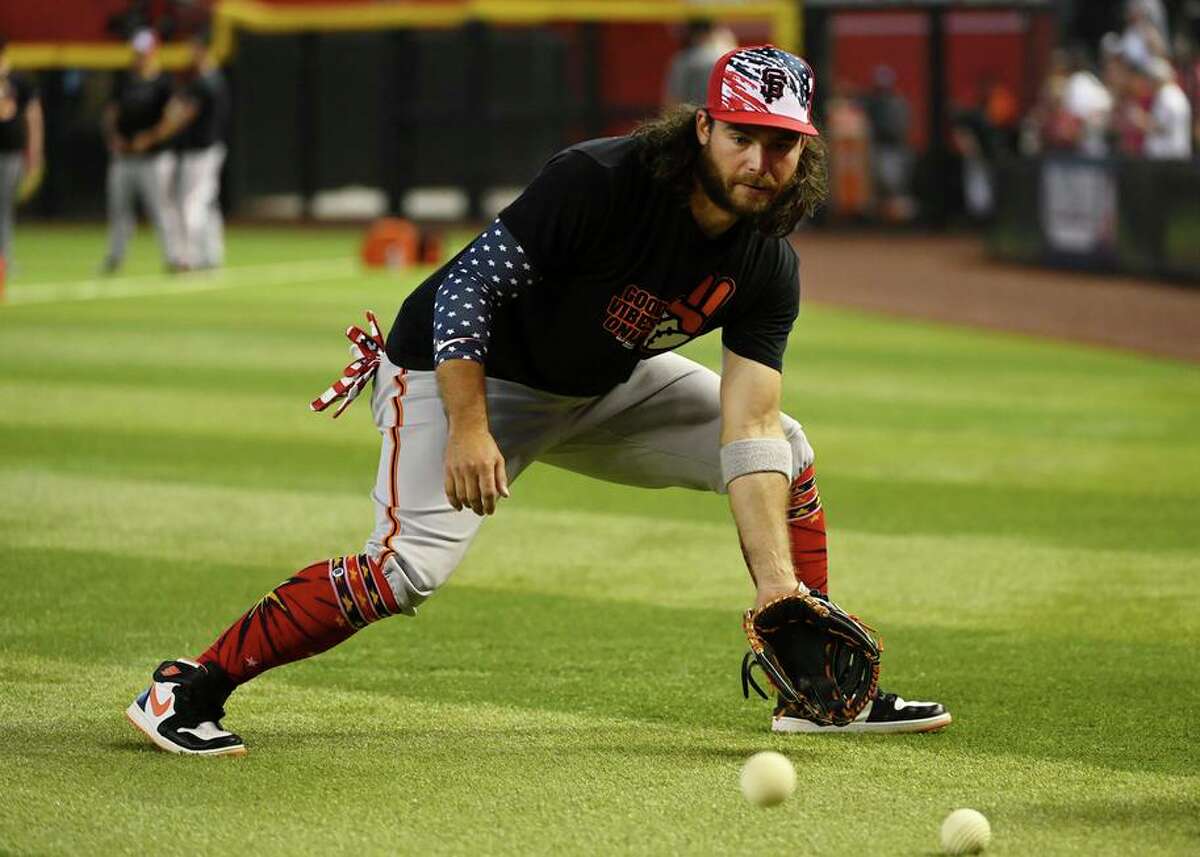 Giants shut down Brandon Crawford with knee discomfort