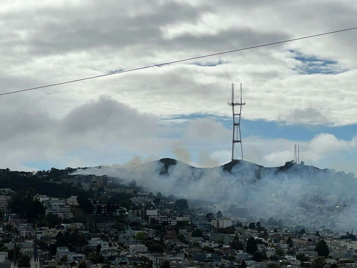 Smoke wafting over the city from a wildfire on San Francisco's Twin Peaks on July 4th, 2022.