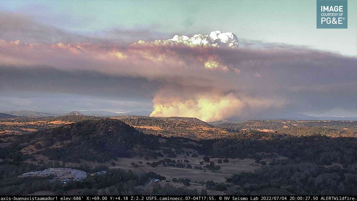 A huge plume of smoke billowing from the Electra Fire on the border between Amador and Calaveras counties in California.