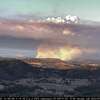 A massive plume of smoke billowing from the Electra Fire on the border between Amador and Calaveras counties in California.