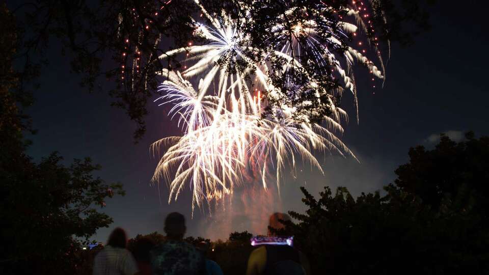 People enjoy fireworks at Freedom Over Texas celebration Monday, July 4, 2022, at Eleanor Tinsley in Houston.