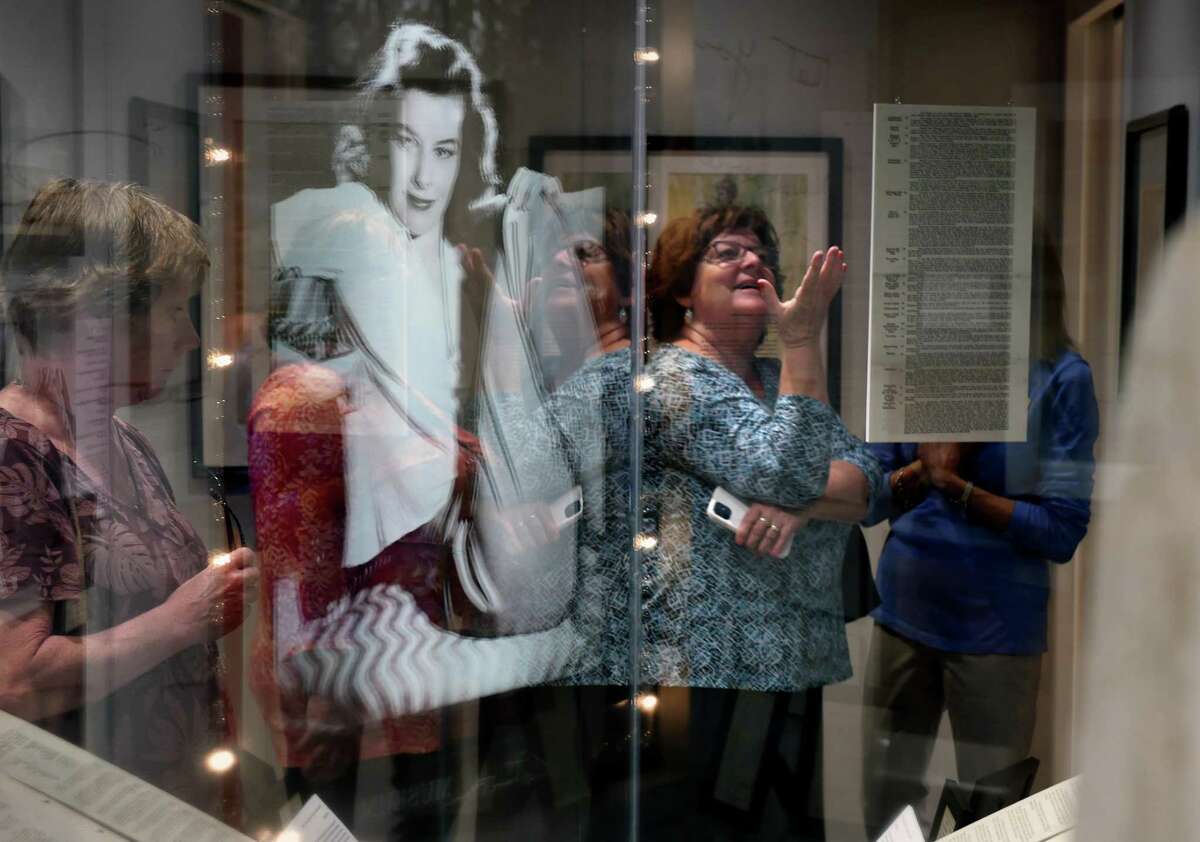 Nancy Mummert, left, and her sister, Linda Smith, center, of Florida tour the Katharine Hepburn Museum in Old Saybrook on July 1.