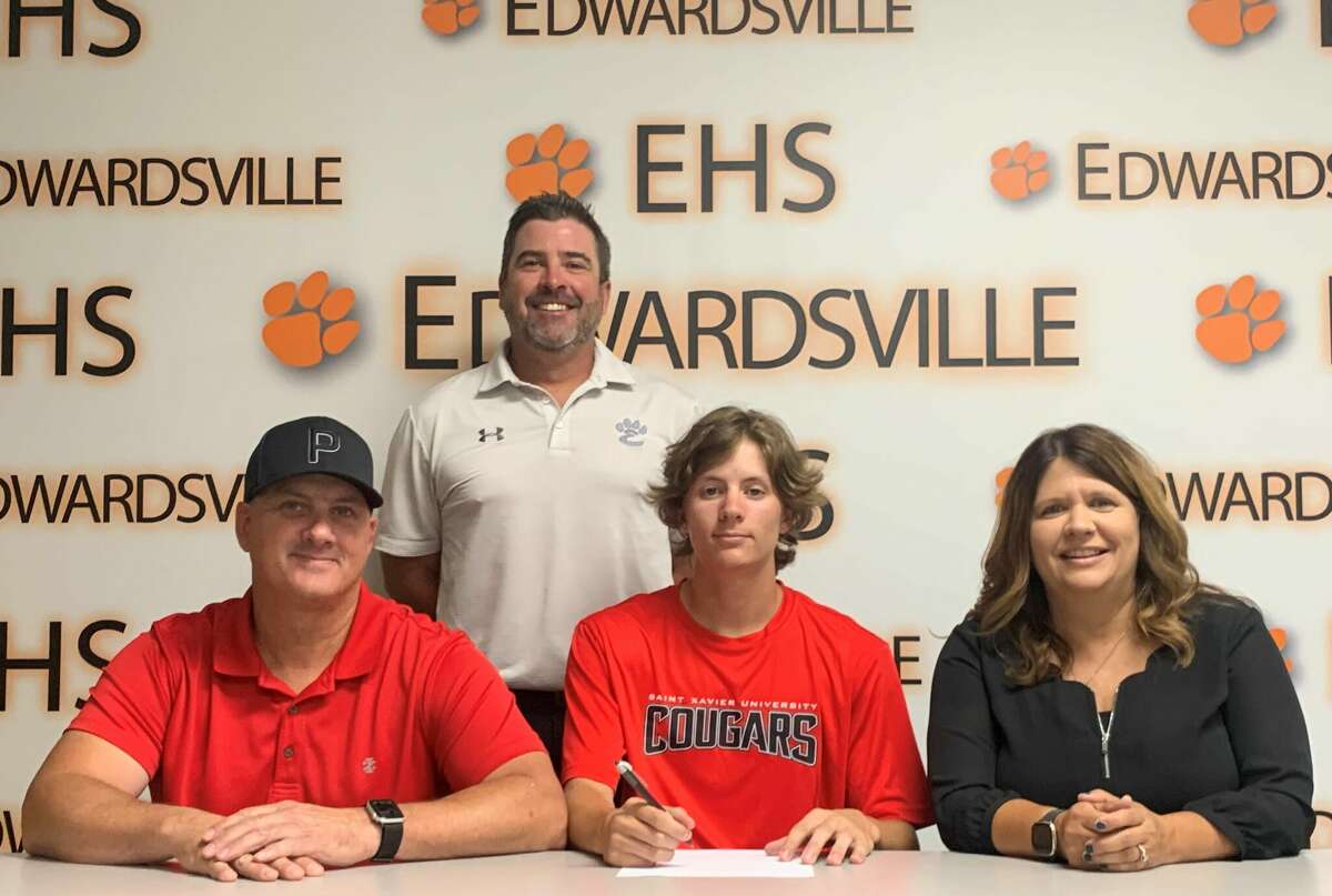 Edwardsville High School graduate Gannon Burns, seated center, will play college baseball at St. Xavier. He is joined in the picture by his parents and EHS coach Tim Funkhouser.