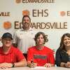 Edwardsville High School graduate Gannon Burns, seated center, will play college baseball at St. Xavier. He is joined in the picture by his parents and EHS coach Tim Funkhouser.