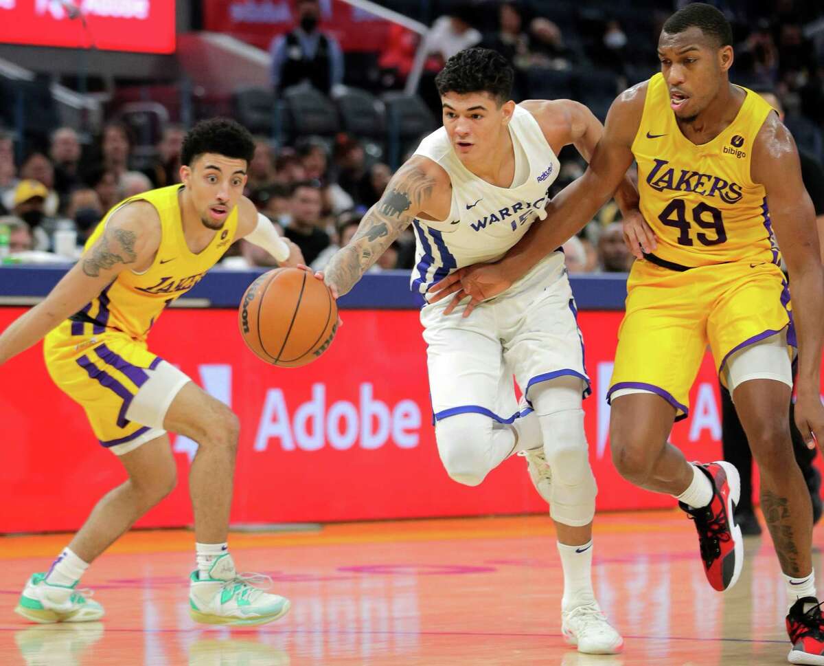 Gui Santos (15) drives to the basket in the first half as the Golden State Warriors played the Los Angeles Lakers summer league teams in the California Classic at Chase Center in San Francisco , Calif., on Sunday, July 3, 2022.