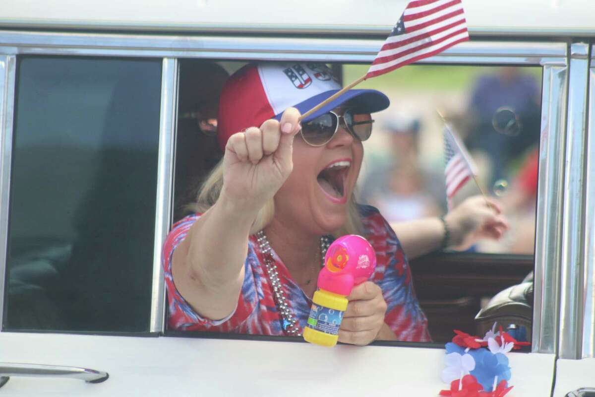 A participant in the city of Friendswood’s July Fourth parade gets into the spirit of the event, which was the community’s 127th celebration of Independence Day.