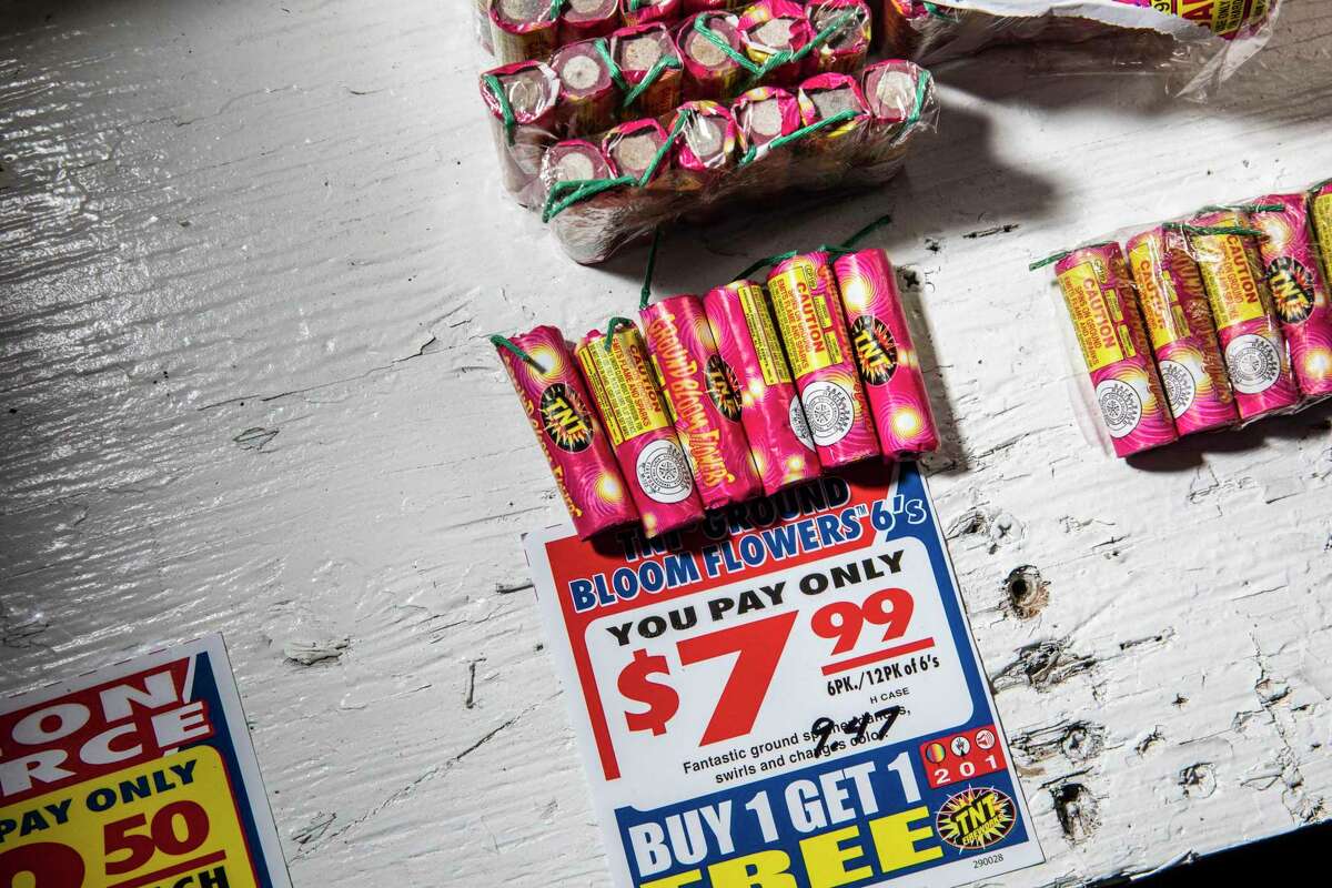Products for sale are seen inside a TNT Fireworks booth in the parking lot of San Bruno Towne Center last July 1. Air quality from fireworks displays fouled air quality across the Bay Area, particularly in the East Bay.