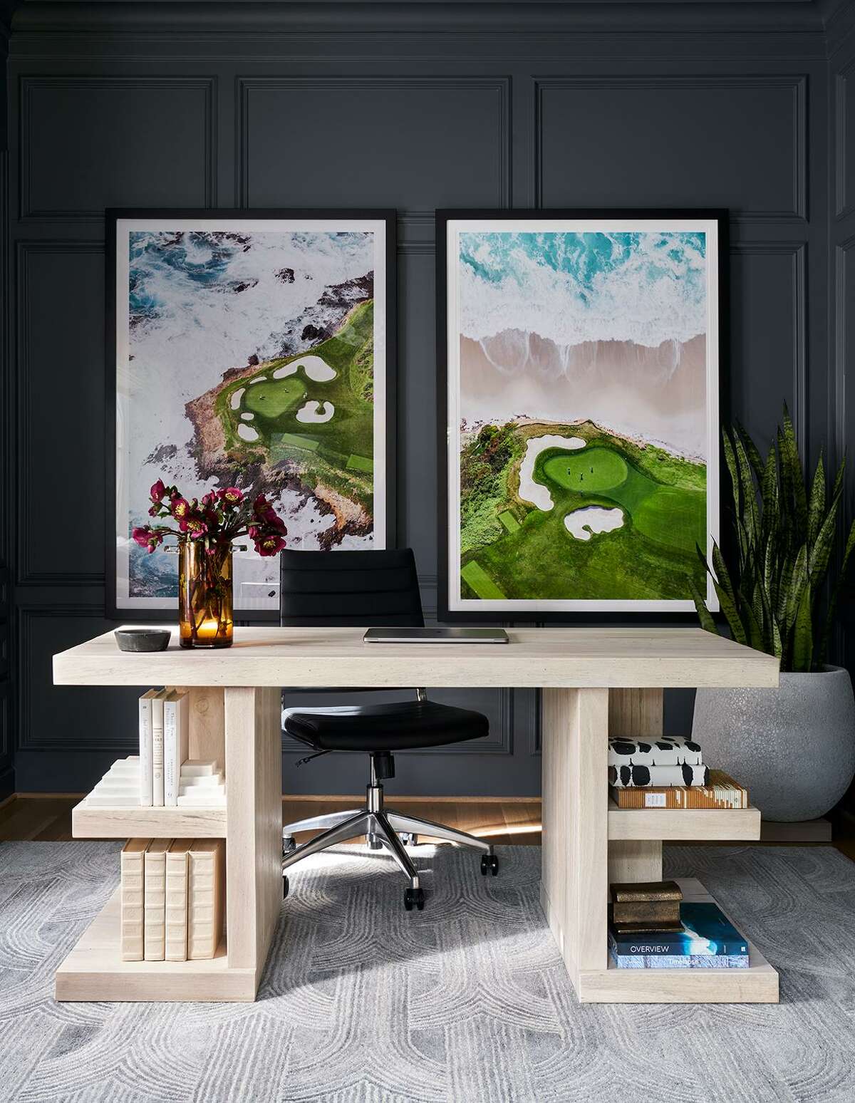 Photography in the Nguyens’ home office shows one of Mike’s favorite places to play golf, Pebble Beach.