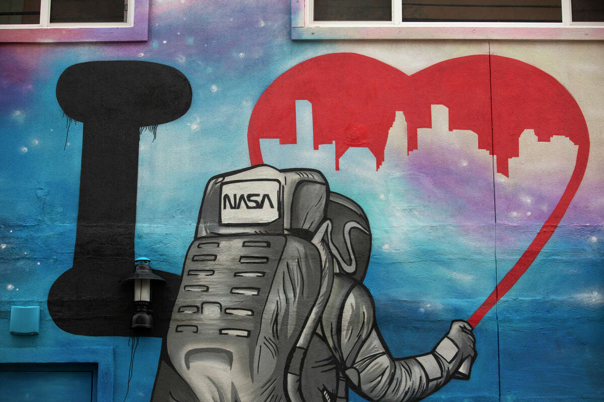 A space-themed mural at Social Beer Garden Friday, April 16, 2021, at Midtown in Houston.
