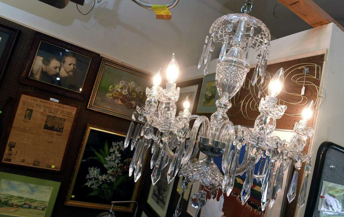 A crystal chandelier for sale at the APK Charities Desert Eagles Nest Thrift Store in Madison on June 30, 2022.