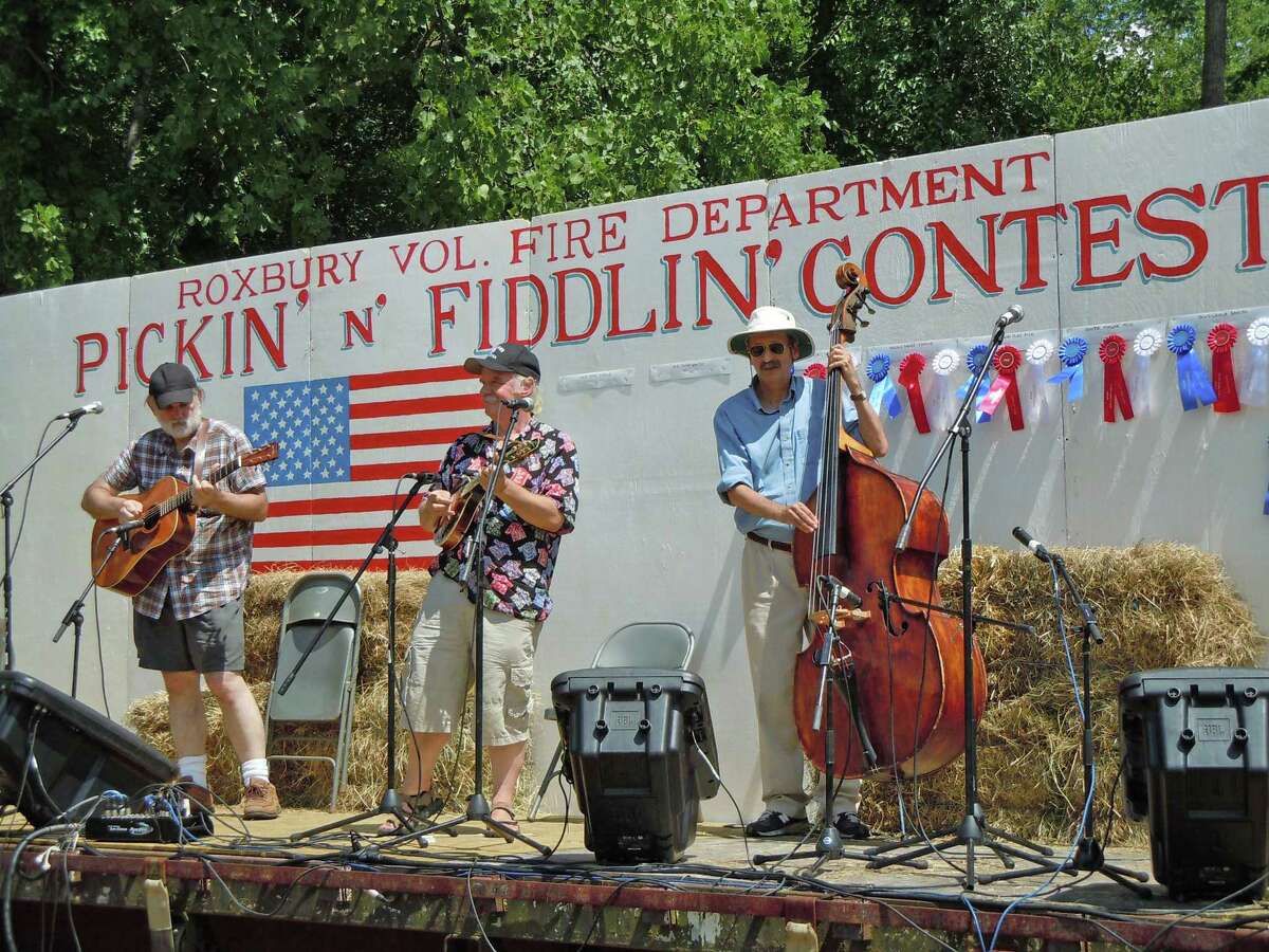 Stringed instruments of all shapes and sizes can be found at the Pickin' and Fiddlin' contest in Roxbury on July 9. Pictured are contestants performing during the 2019 contest.