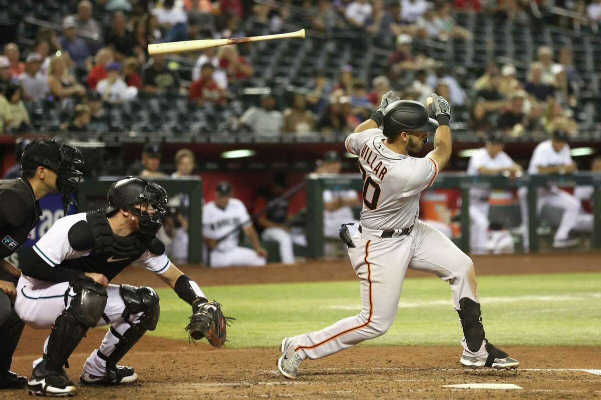 PHOENIX, ARIZONA - JULY 05: David Villar #70 of the San Francisco Giants loses his bat during the seventh inning of the MLB game at Chase Field on July 05, 2022 in Phoenix, Arizona. (Photo by Christian Petersen/Getty Images)
