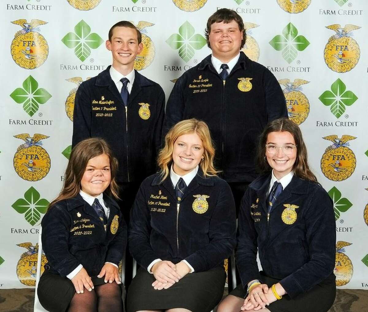 Seated from left are Illinois FFA State Treasurer Kate Colgan of Laura, President Rachel Hood of Industry and Secretary Haley Bode of Waterloo. Standing from left are Reporter Levi Maierhofer of Seneca and Vice President Derek Sample of Sesser. 