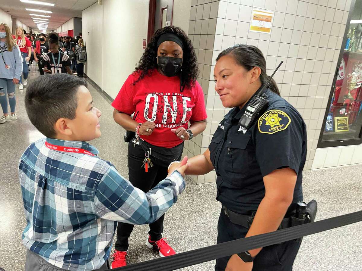 Deputy Fuentes with the Harris County Pct. 3 Constable’s office interacts with students at Crosby ISD.