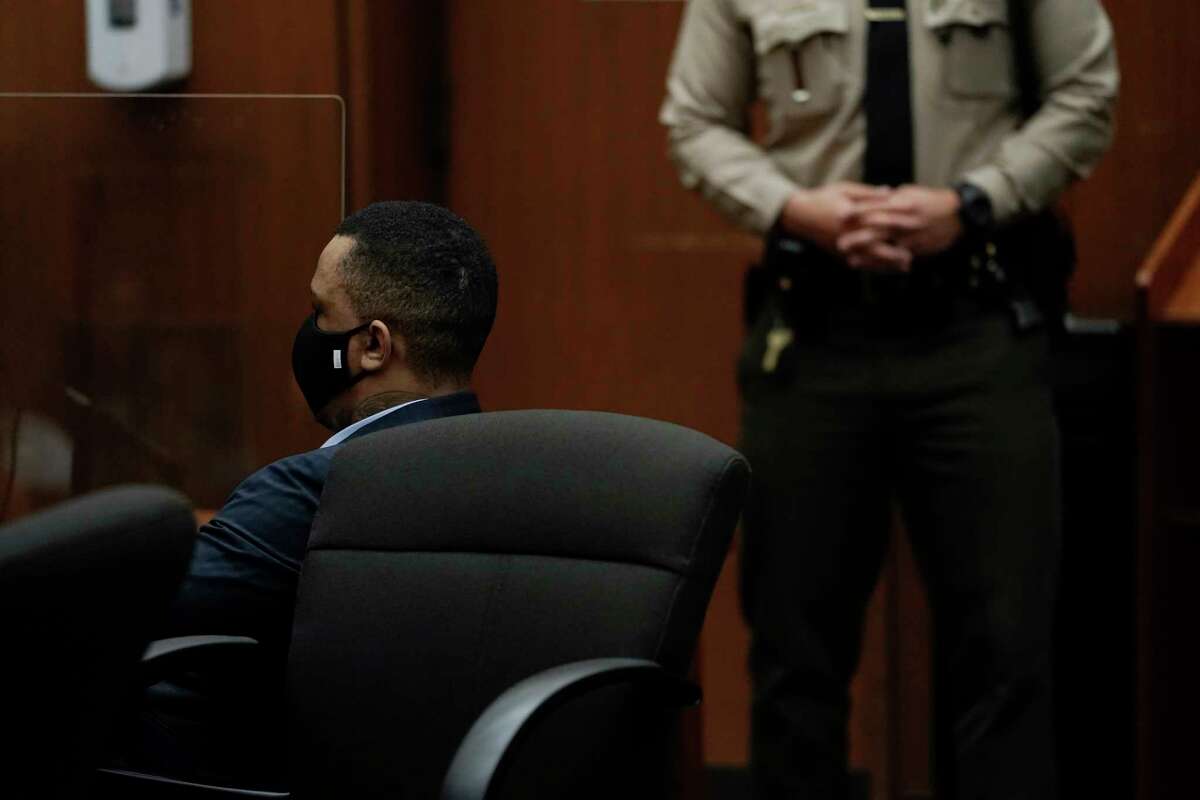 Eric Holder Jr., who is accused of killing rapper Nipsey Hussle, sits in a courtroom for his verdicts at Los Angeles Superior Court in Los Angeles, Wednesday, July 6, 2022. Jurors found Holder guilty of first-degree murder Wednesday for the 2019 fatal shooting of Nipsey Hussle.