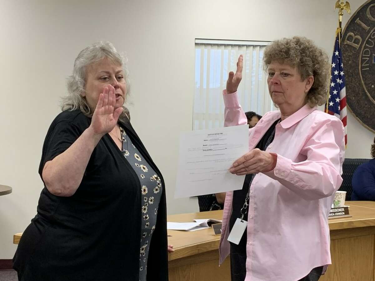 Staffen sworn in as new city treasurer in Big Rapids 4 Carla Staffen (left) takes the oath of office administered by city clerk Tamyra Gillis (right). Staffen was appointed as the new city treasurer by the Big Rapids city commission during its meeting this week.