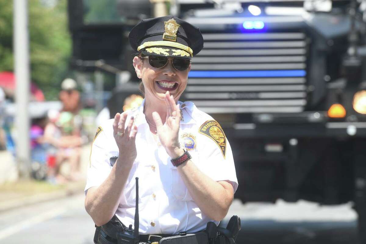 Acting Police Chief Rebeca Garcia marches in the Barnum Festival Great Street Parade, in Bridgeport, Conn. June 26, 2022.