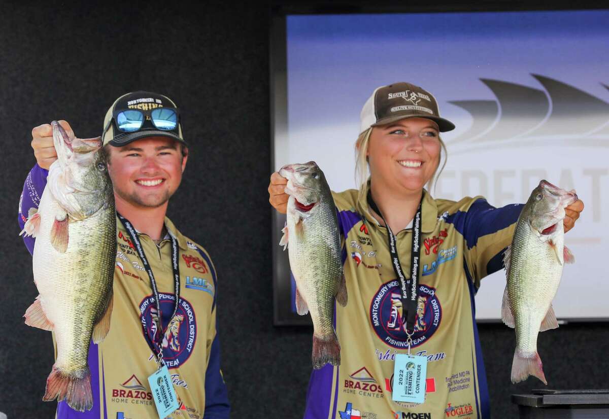 Fallon Clepper, right, and her partner, Wyatt Ford, hold up their catches at the 2022 High School Fishing National Championship last month.
