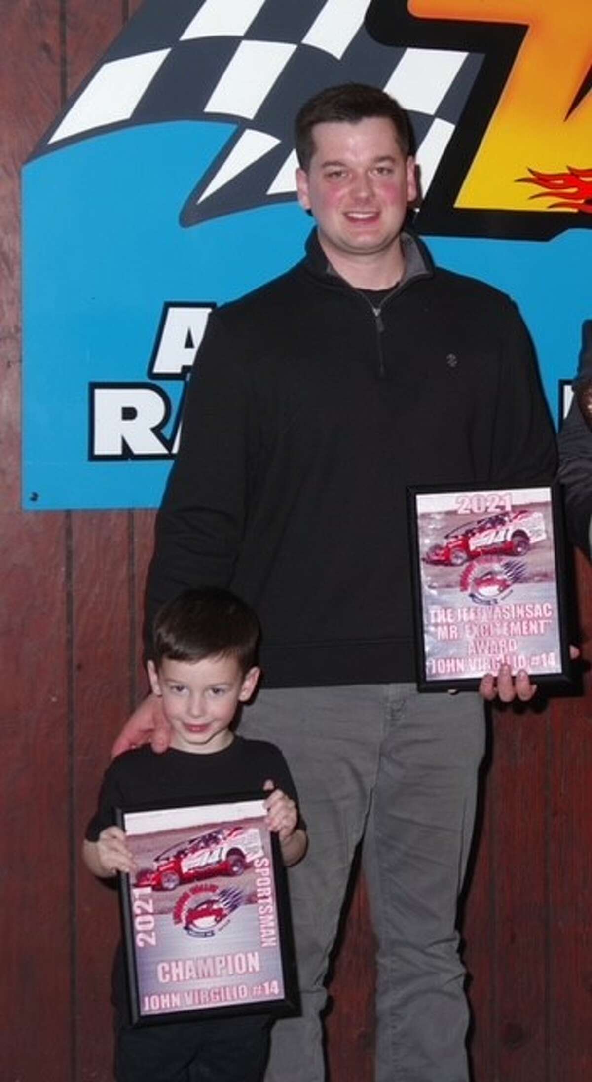 Sportsman driver John Virgilio accepts the ‘Jeff Yasinsac Mr. Excitement Award’ for his exciting driving style in March at the Valleys Awards banquet.