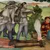 The historic mural at George Washington High School has drawn controversy, partly for how it depicts the treatment of American Indians and African Americans.