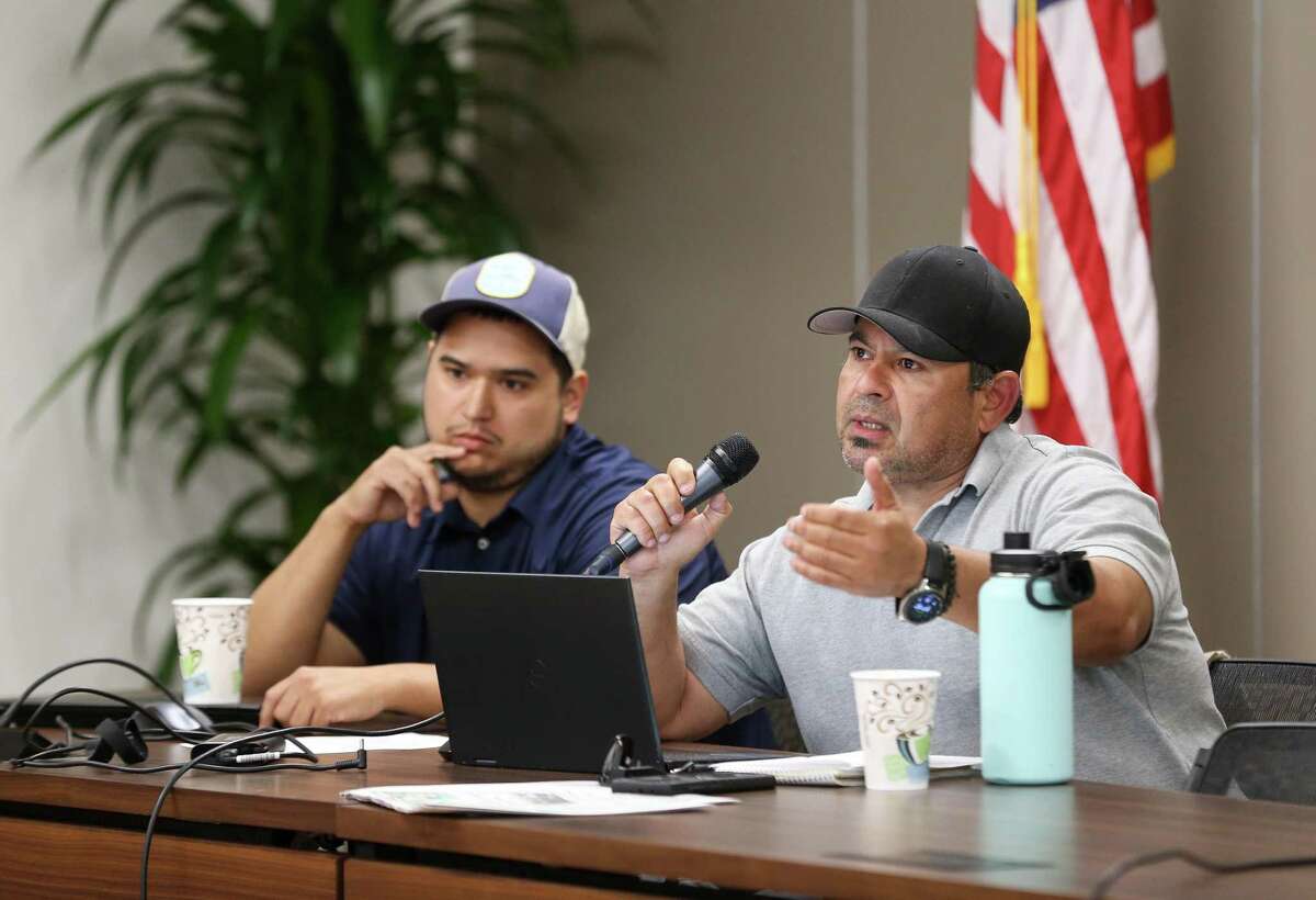 Meliton Gomez, who is trying to build a concrete batch plant in Aldine, answers questions from residents during a public meeting hosted by TCEQ at the East Aldine Management District building on Thursday, April 7, 2022, in Houston.