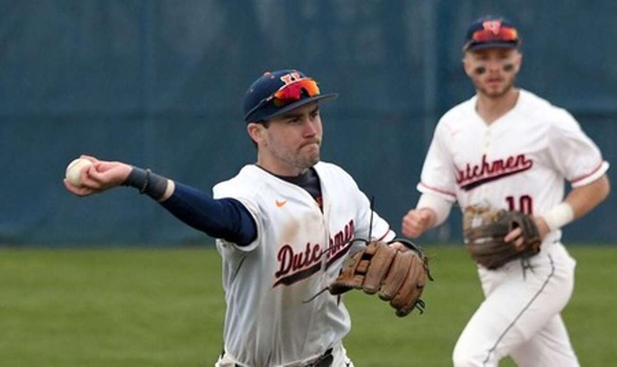 Hope College's Al Money prepares to throw to first during a game in the 2022 season.