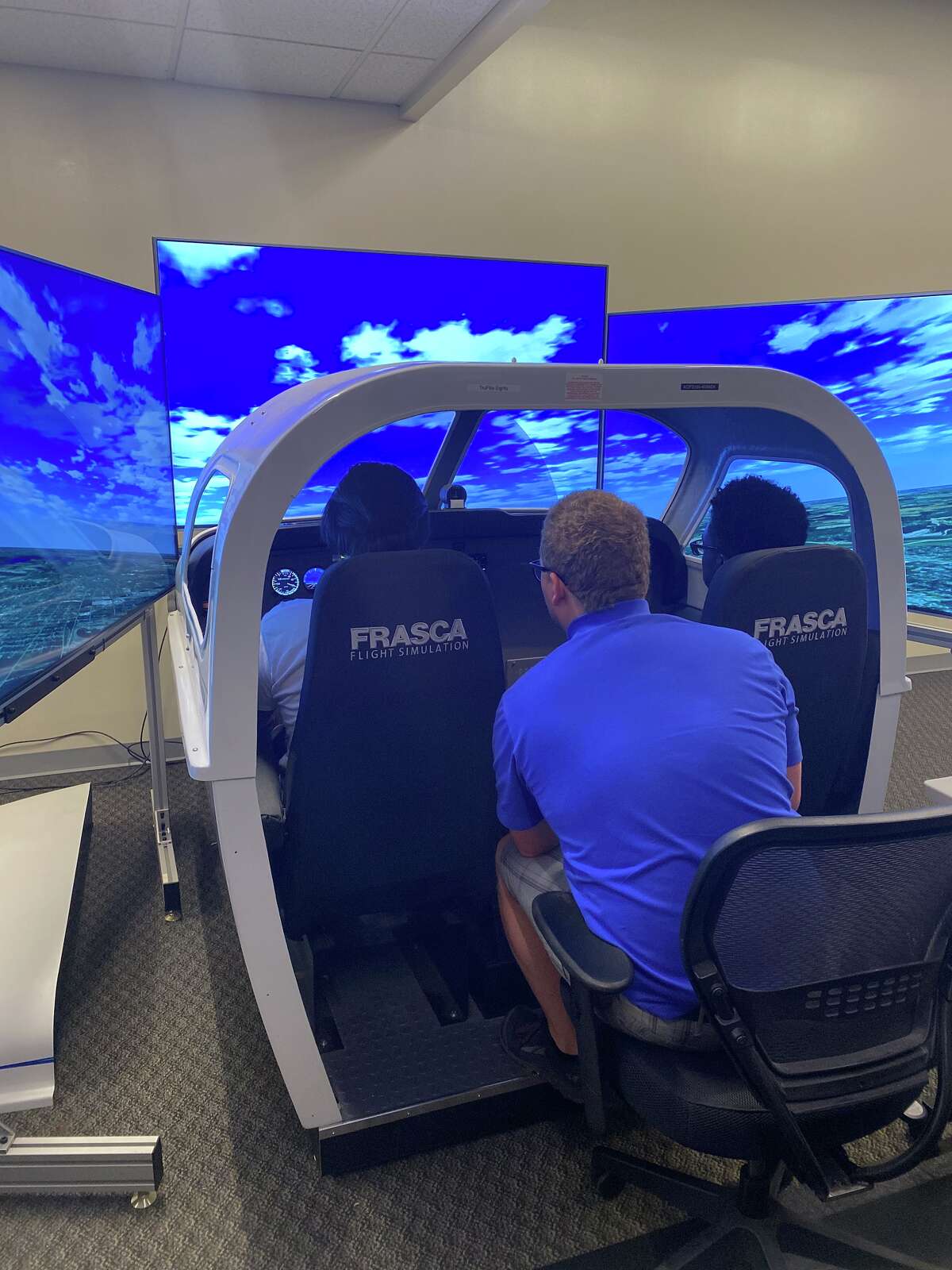 A student gets time in one of the simulators.