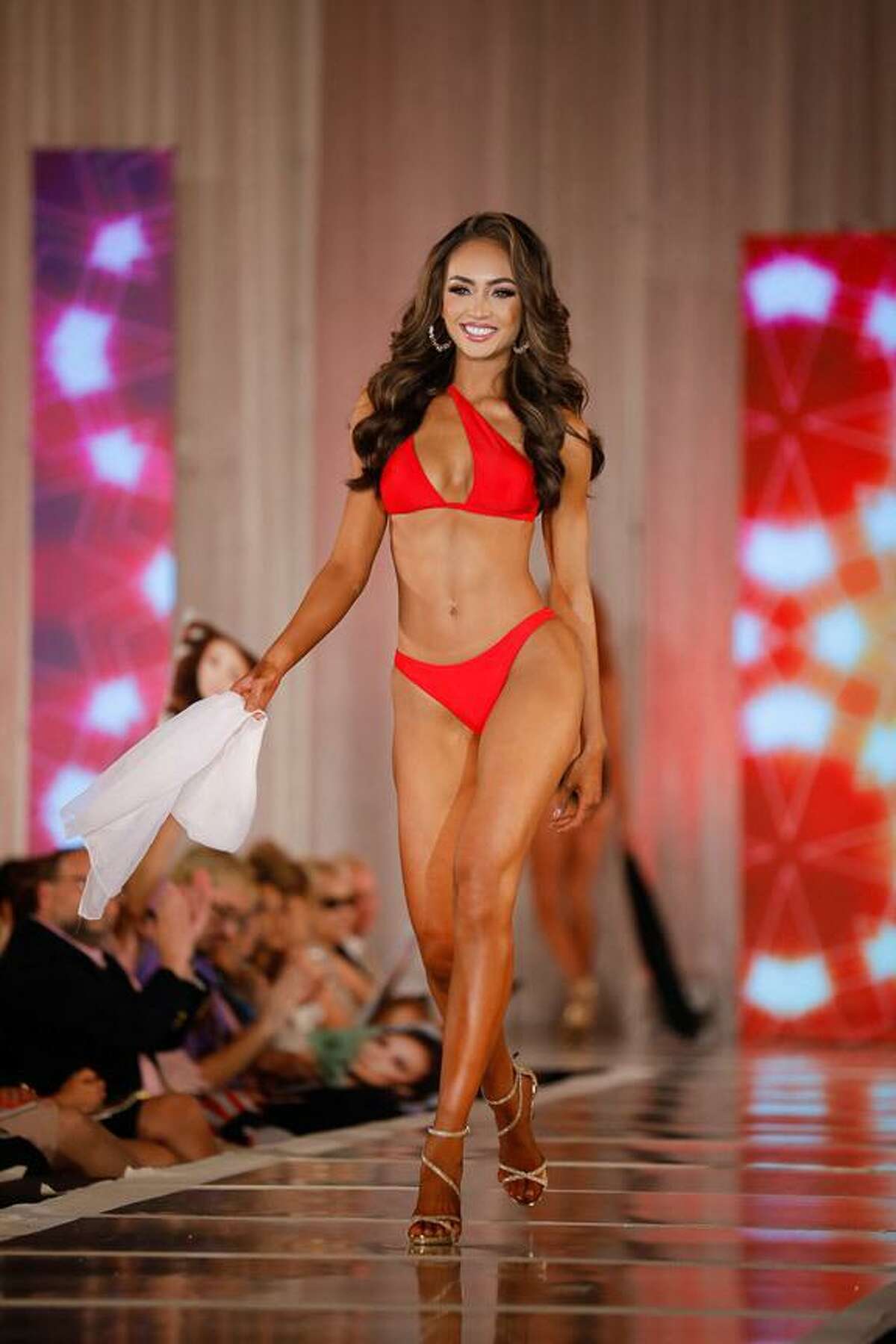 R’Bonney Gabriel participates in the swimsuit portion of the Miss Texas USA pageant.