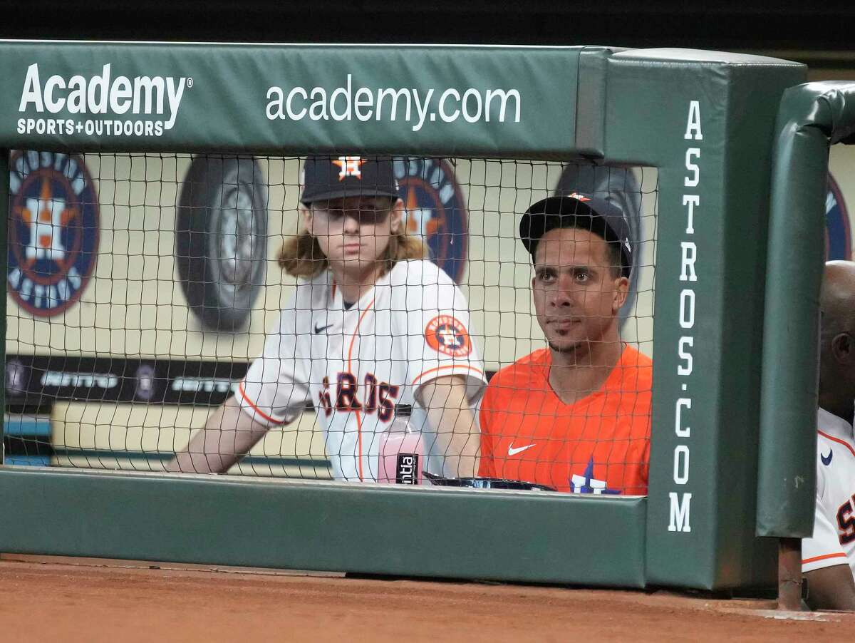 Houston Astros Michael Brantley watches from the dugout during the first inning of a MLB game at Minute Maid Park on Thursday, July 7, 2022 in Houston.