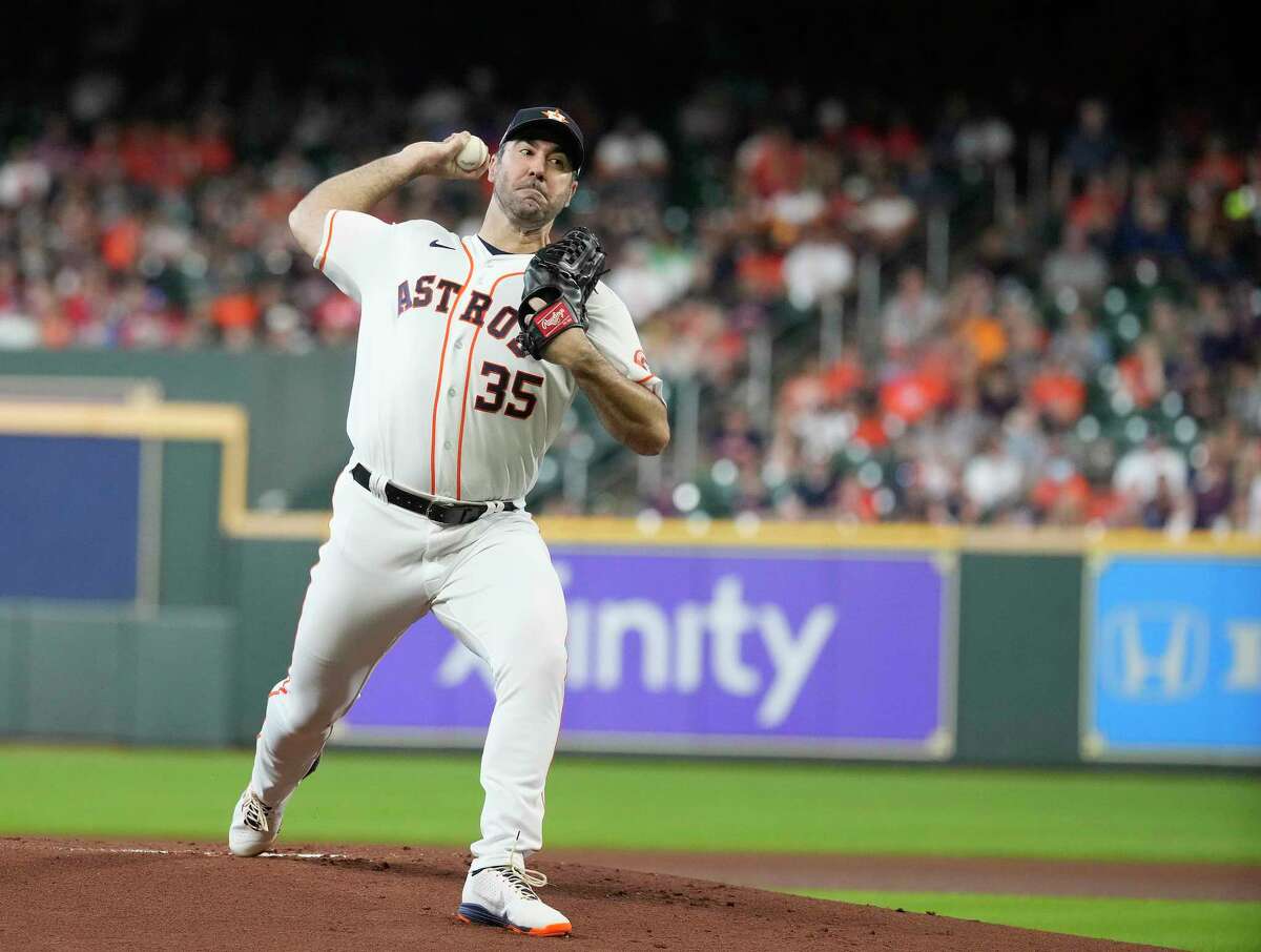 Houston Astros starting pitcher Justin Verlander (35) pitches Kansas City Royals Whit Merrifield (15)during the first inning of a MLB game at Minute Maid Park on Thursday, July 7, 2022 in Houston.