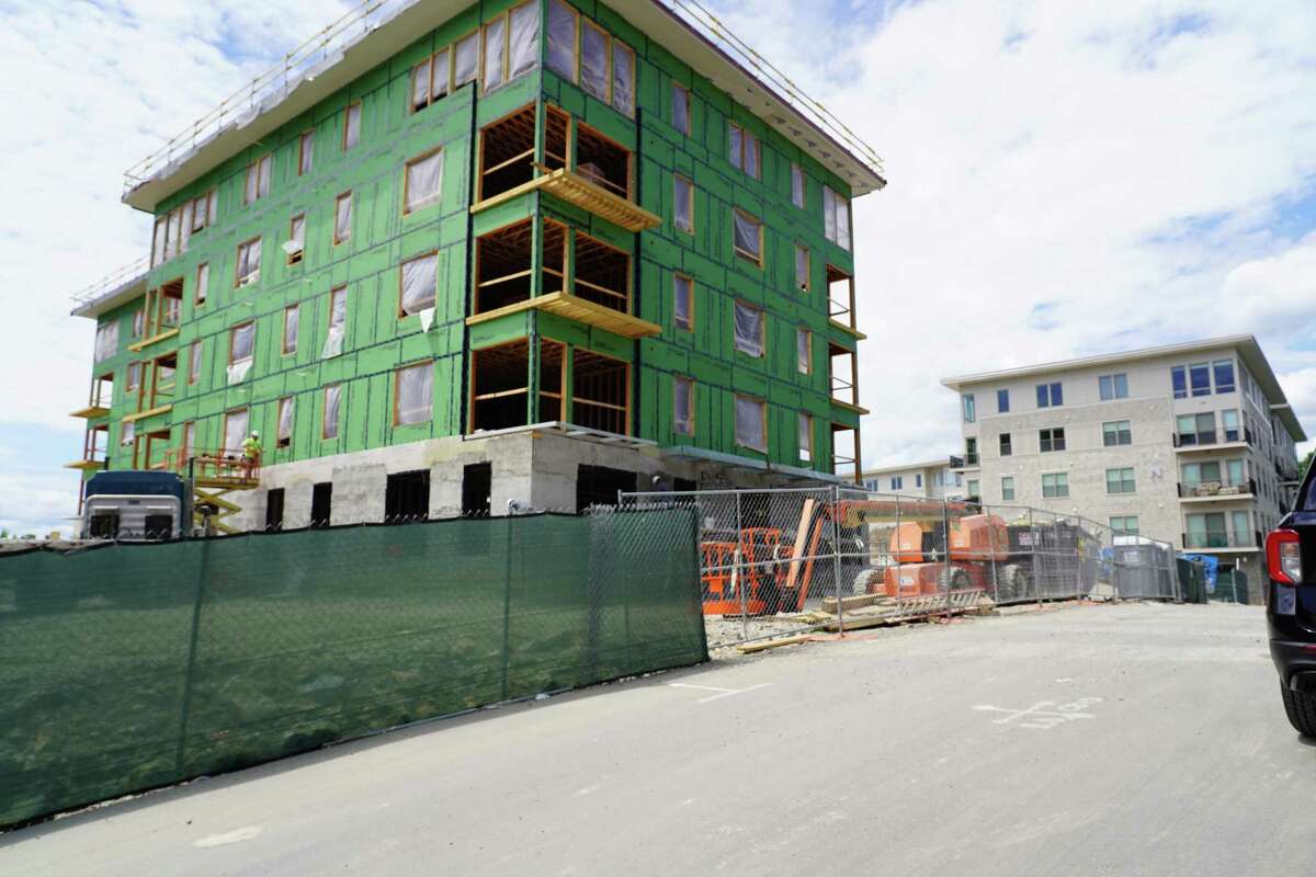 How many New Canaan affordable housing units are needed to fufill 830g