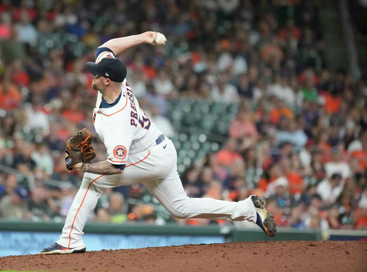 Houston Astros relief pitcher Ryan Pressly (55) pitches to Kansas City Royal Ryan O'Hearn during the ninth inning of a MLB game at Minute Maid Park on Thursday, July 7, 2022 in Houston.
