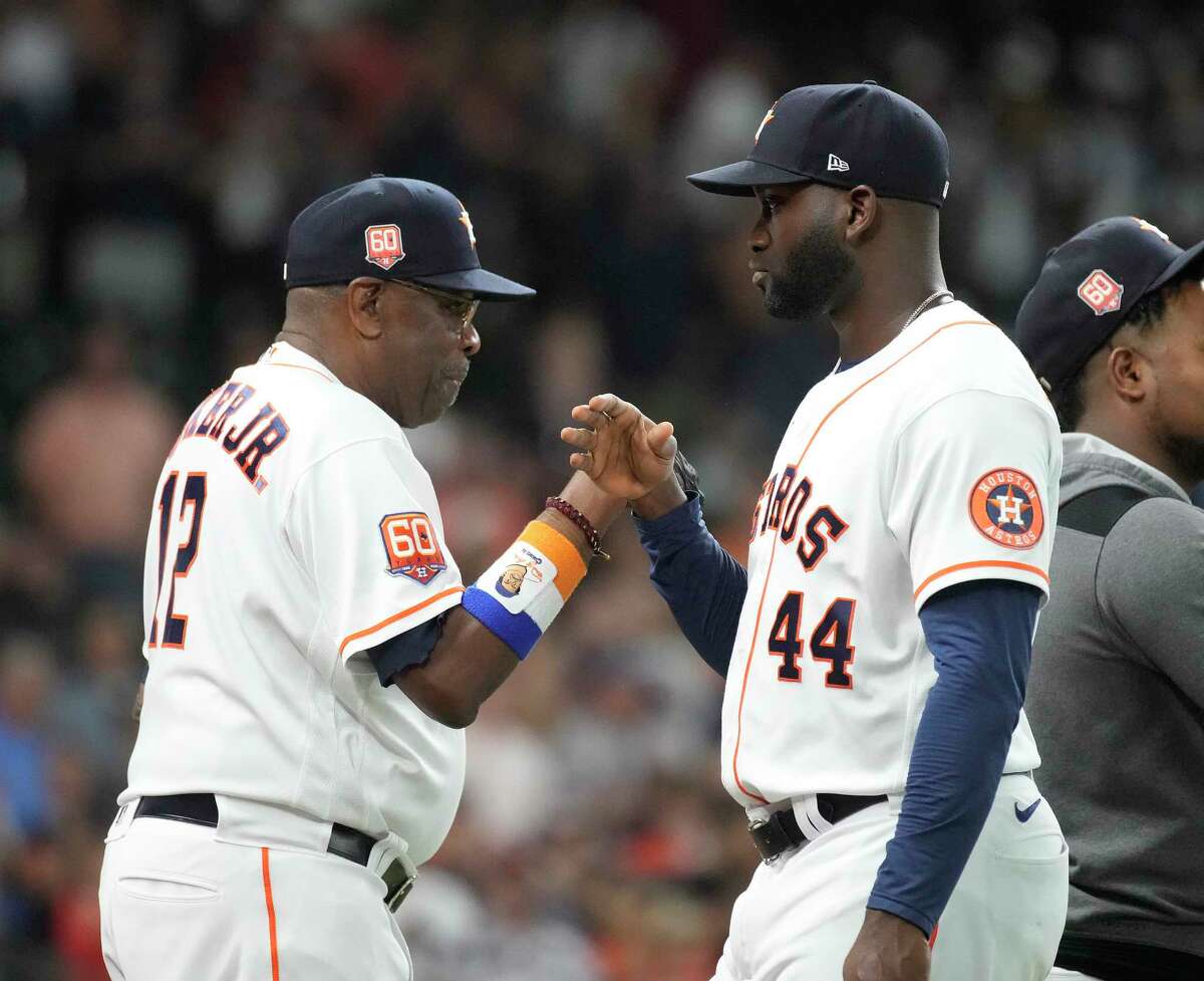 Manager Dusty Baker, left, knows he's in good hands with Yordan Alvarez as the No. 3 hitter in the Astros' lineup. 