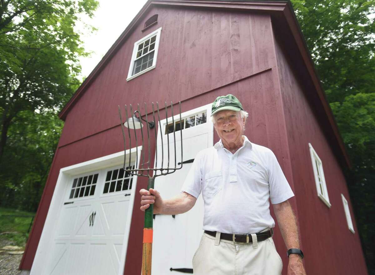 Bill Dyer, chairman of the Shelton Trails Committee, outside the group's new barn at the Shelton Dog Park in Shelton, Conn. on Thursday, July 7, 2022. The barn is used for equipment storage, maintenance, and the group's meetings.