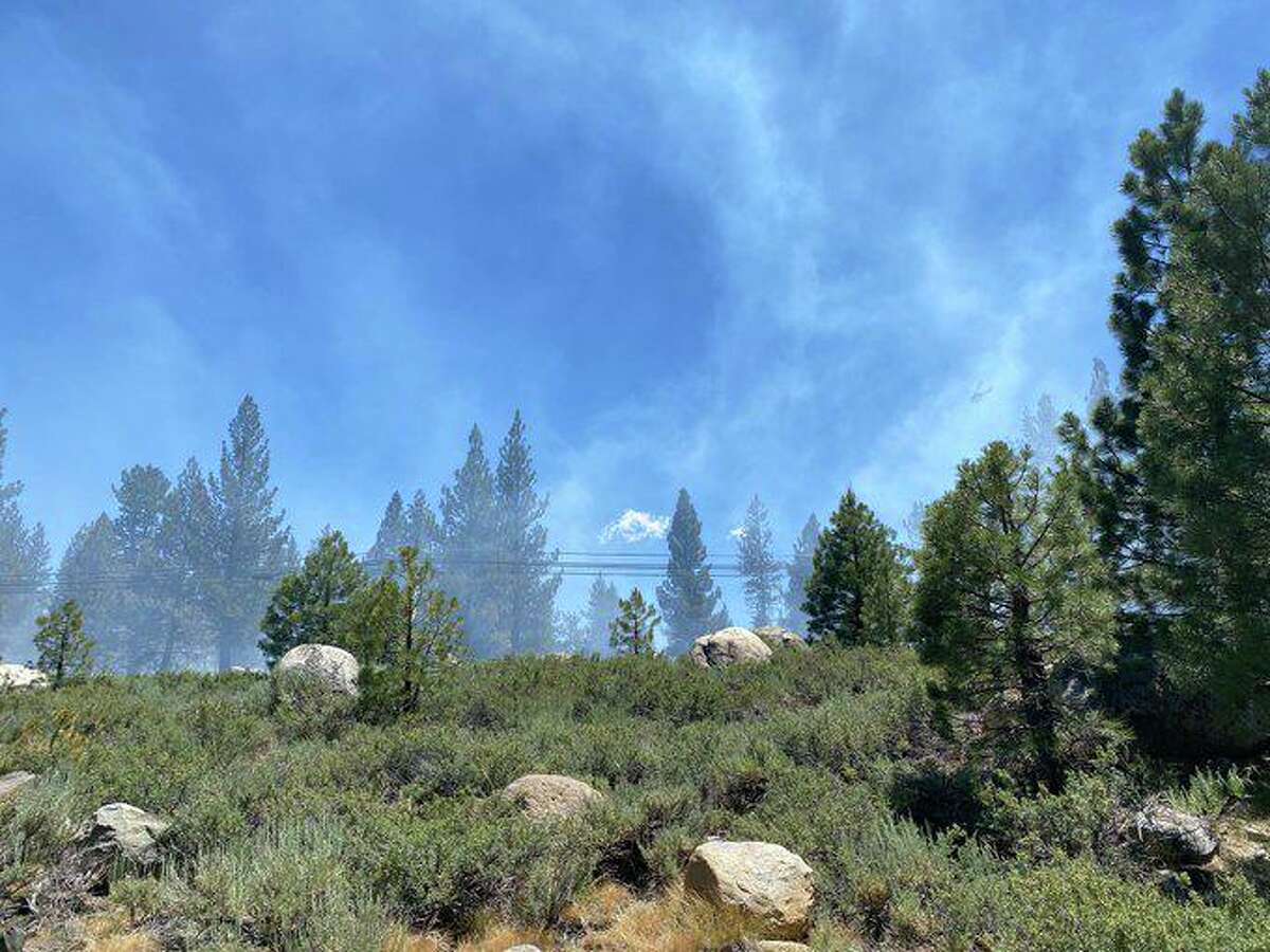 A wildfire burning in Truckee prompted evacuation orders on Thursday afternoon, Truckee fire and police officials said. The fire, dubbed the Butterfield Fire, scorched about 12 acres in the area of Joerger Drive and Martis Valley, officials said.