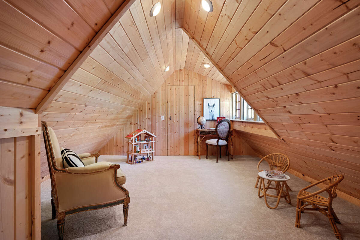 The playroom / attic leads to the bedroom.