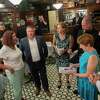 Patsy's owner, William "Tragedy" Yager, third from right, is seen with Georgette Steffens, executive director Downtown Albany Business Improvement District (BID), left, Albany County Legislator Dan McCoy, second from left, Assemblymember Patricia Fahy, third from left, Albany Mayor Kathy Sheehan, second from right, Albany County Legislator Sam Fein, right, as Patsy’s Barber Shop is designated to the State Historic Business Registry on Friday, July 8, 2022 in Albany, N.Y. Patsy’s Barber Shop is one of Albany’s oldest and most well-known businesses, operating in the City since the year 1930. Today, owner William ‘Tragedy’ Yager continues the tradition of Patsy’s as only the third-ever owner.