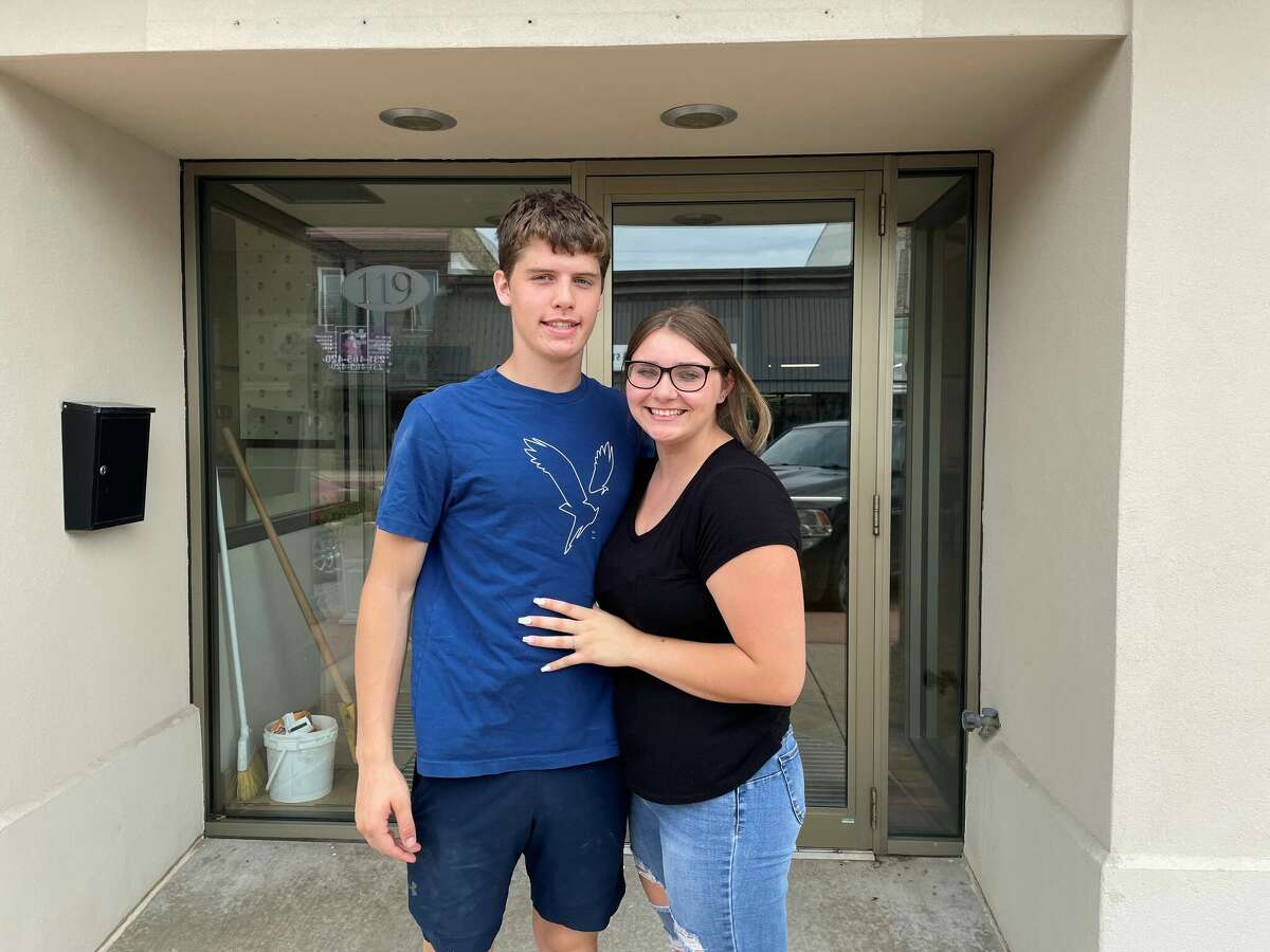 Ayla Schmidt and her boyfriend Josiah beard outside the soon-to-be dance studio in downtown Reed City.