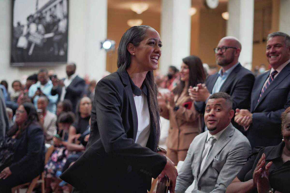 Newly appointed San Francisco District Attorney Brooke Jenkins interacts with attendees during her swearing-in ceremony at City Hall.