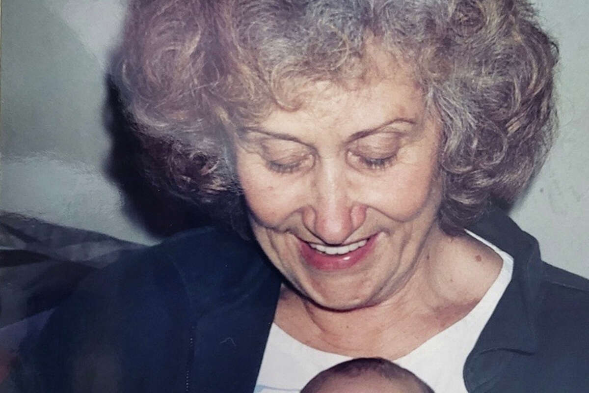 A photo of Wendy Winston’s mother Patricia Anne Luer with her grandchild and Wendy’s daughter Analisa Curzi in 1994.