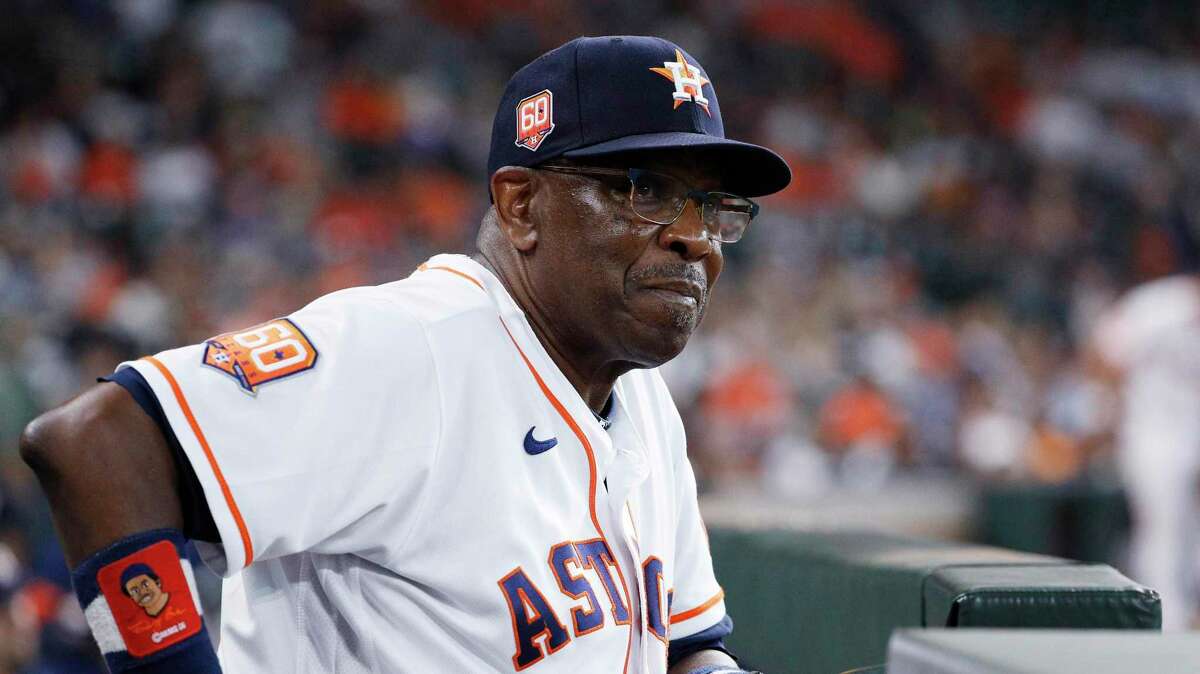 Houston Astros manager Dusty Baker Jr. looks at the video board during a replay review in the second inning of a baseball game against the Kansas City Royals Wednesday, July 6, 2022, in Houston. (AP Photo/Kevin M. Cox)