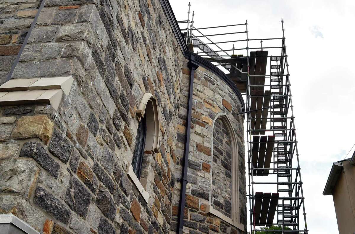 An exterior view of ongoing construction and restoration work at St. Roch's Church in Greenwich, Conn., on Friday July 8, 2022.