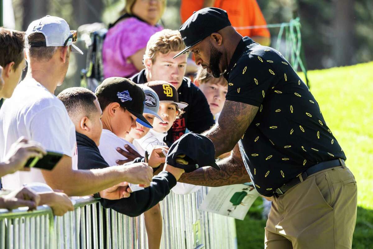 CC Sabathia signs autographs for a group of young fans at the American Century Championship Celebrity Golf event at Edgewood Tahoe Resort in Stateline, NV.