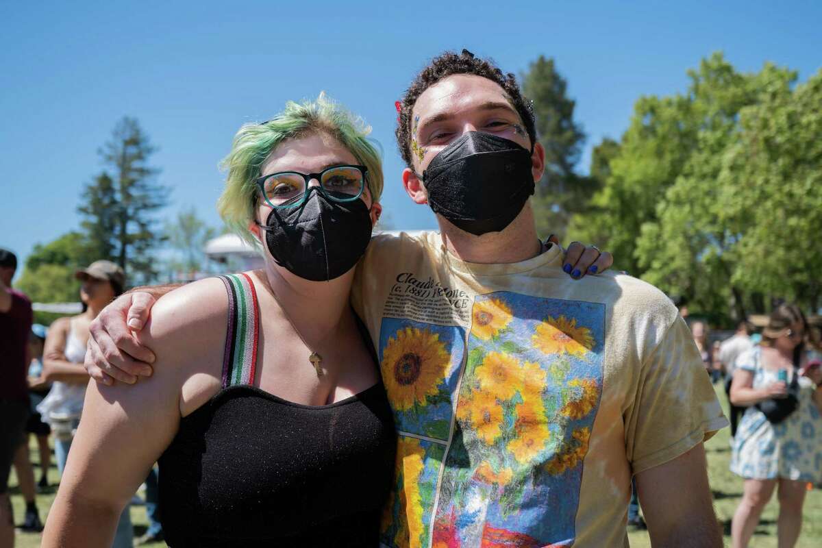 Two masked fans on the final day of the BottleRock Napa Valley music festival in Napa, Calif., on May 29, 2022 said it was a “calculated risk” to be there. COVID-19 hospitalizations in California and the Bay Area have climbed to their highest point since February.