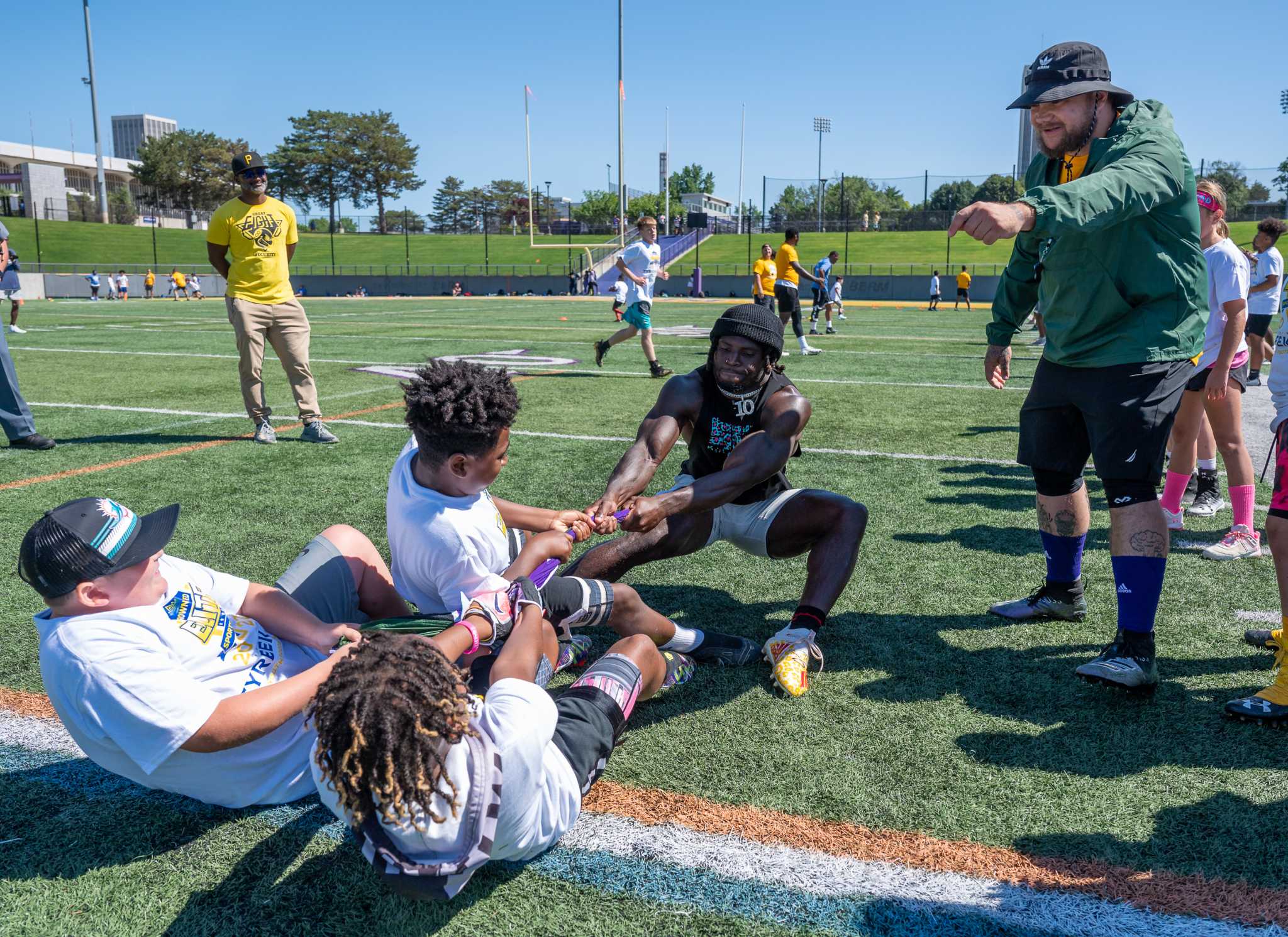 Photos Dolphins star Tyreek Hill visits UAlbany for football camp