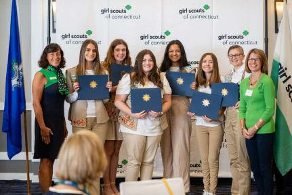 From left, Diana Mahoney, Chief Executive Officer of Girl Scouts of Connecticut (GSOFCT), presents GSOFCT Gold Award Scholarships to Rachel Amatruda of Guillford, Erin Dalton of Colchester, Maeve Tucker of Burlington, Neya Kidambi of Trumbull, Libby Riggs of Haddam and MJ Taylor of Sandy Hook along with Pamela Scagliarini, Chairperson of the GSOFCT Board of Directors at the Annual Girl Scout Gold Award Ceremony on June 5, 2022 in Waterbury.