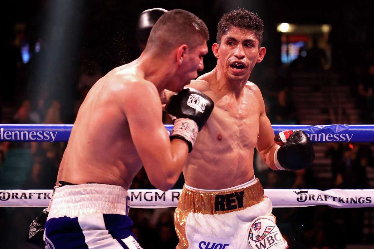 Rey Vargas, right, punches Leonardo Baez during their featherweight bout at MGM Grand Garden Arena on Nov. 6, 2021, in Las Vegas.