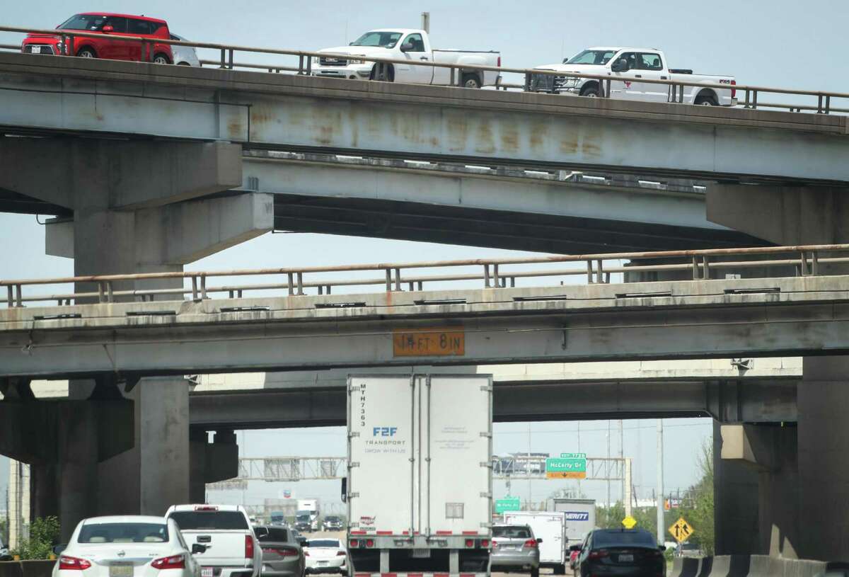 Traffic moves through the Interstate 10 interchange with Loop 610 on April 14, 2022, in Houston. Highways remain a centerpiece of Texas’ $85.1 billion transportation plan for the next decade, despite calls in Metro areas to focus less on widening and more on managing key crossings to eliminate bottlenecks.