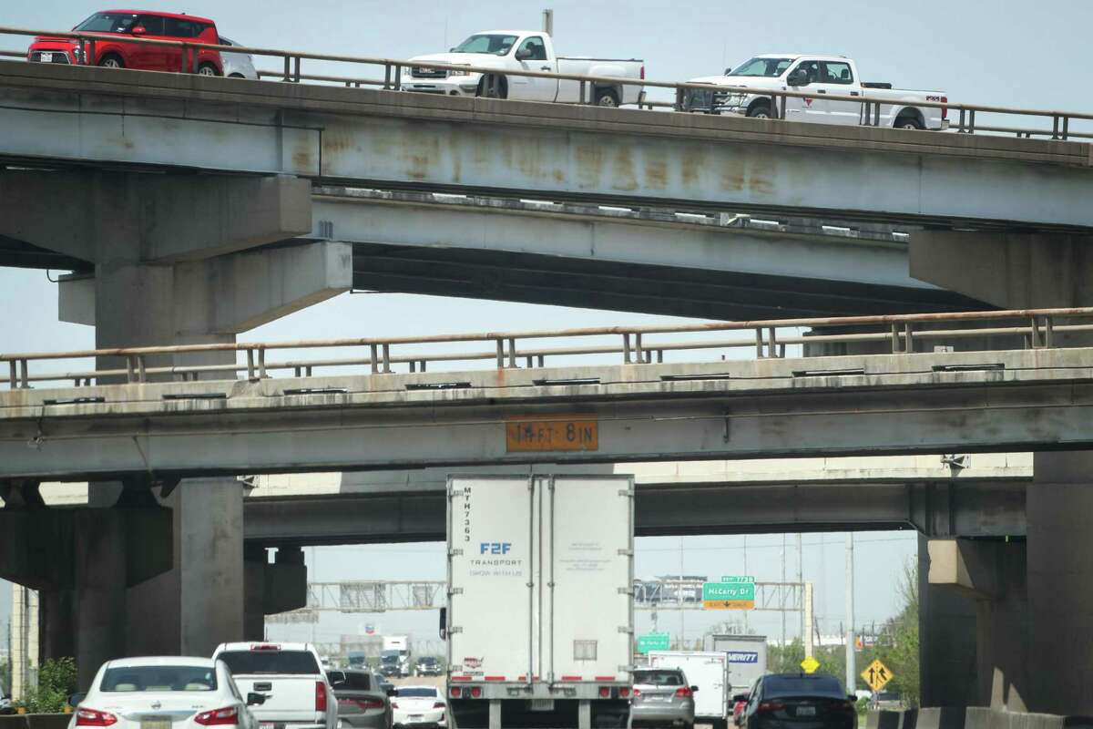 Traffic moves through the Interstate 10 interchange with Loop 610 on April 14, 2022, in Houston. Highways remain a centerpiece of Texas' $85.1 billion transportation plan for the next decade, despite calls in Metro areas to focus less on widening and more on managing key crossings to eliminate bottlenecks.