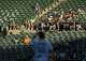 Oakland Athletics’ fans watch the A’s play the Toronto Blue Jays during MLB game at Oakland Coliseum in Oakland, Calif., on Tuesday, July 5, 2022.